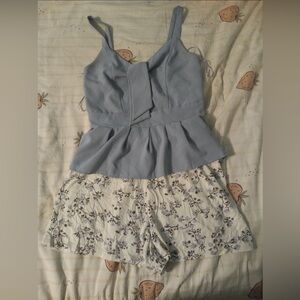 Blue v neck blouse with floral shorts